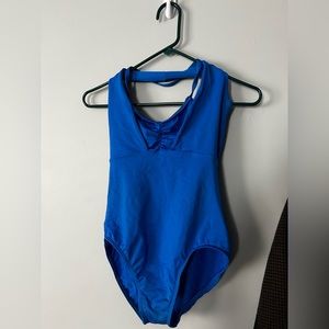 Motion wear blue halter with overlay.